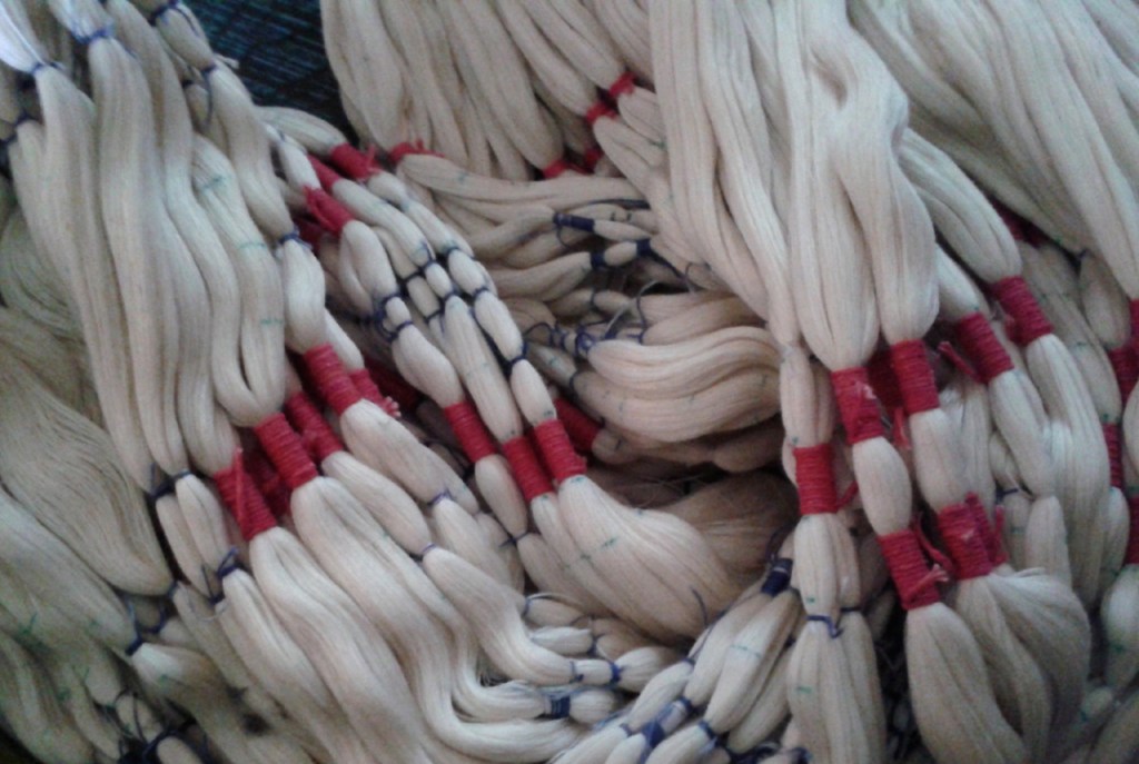 tie-dye threads , knotted prior to dyeing